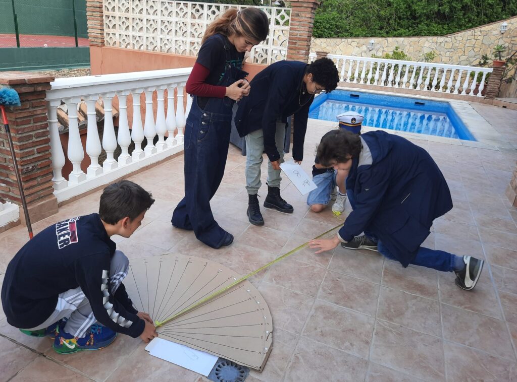 Students using a measuring tape