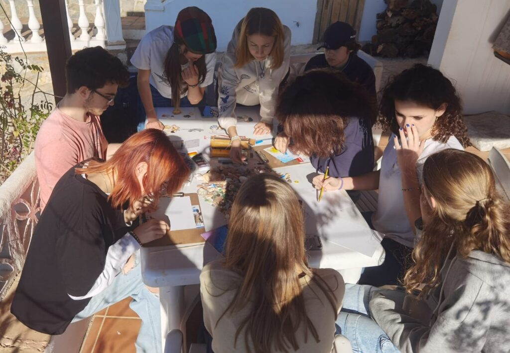 students doing arts and crafts around table
